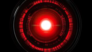 Abstract close-up of red glowing circular rings against a black background, suggesting a high-tech or sci-fi theme.