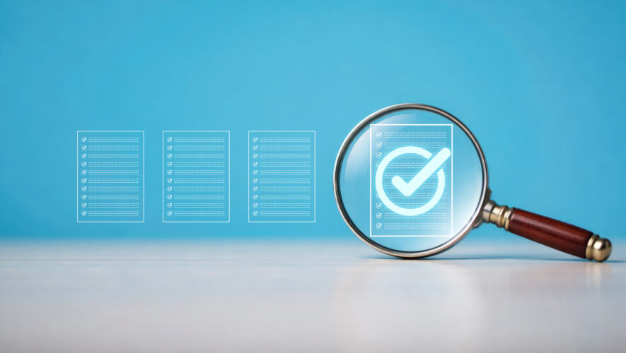 Magnifying glass inspecting digital verification checkmark icons ...