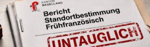 Document titled 'Bericht Standortbestimmung Französisch' with a large red 'UNTauglich' stamp, indicating unfitness or ineligibility.